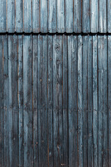 Old rustic pine wood wall painted in black as background