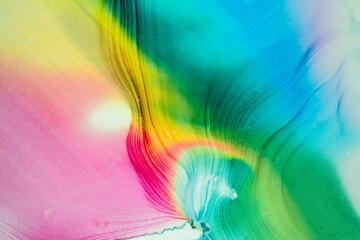 Abstract alcohol ink fluid art background. Rainbow colored