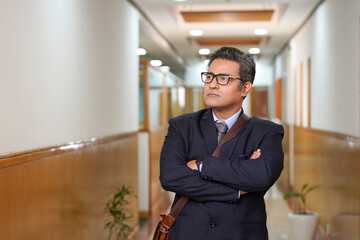 Fototapeta premium Indian businessman wearing suit and giving expression.