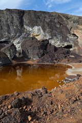 Naklejka na ściany i meble acidic waters in pyrite smelting landfill in Riotinto, Spain