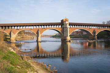 Ponte Coperto(covered bridge) is a bridge over the Ticino river in Pavia at sunny day, Lombardy, Pavia, Italy