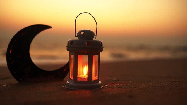 Islamic concept view Candle light on the beach during sunset