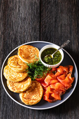 pancakes with sliced cold smoked salmon, top view