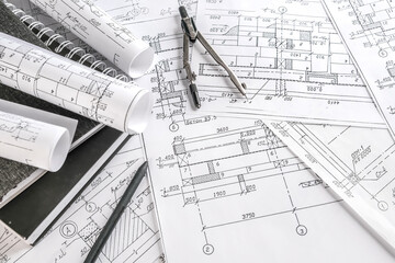 Architects concept, engineer architect designer freelance work on start-up project drawing, construction plan architect design working drawing sketch plans blueprints and making construction model