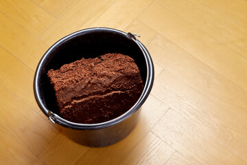 How to make cheap grow or potting soil from coco coir bricks, step 4: the rehydrated block has increased to about 3 to 4 times of its original volume.