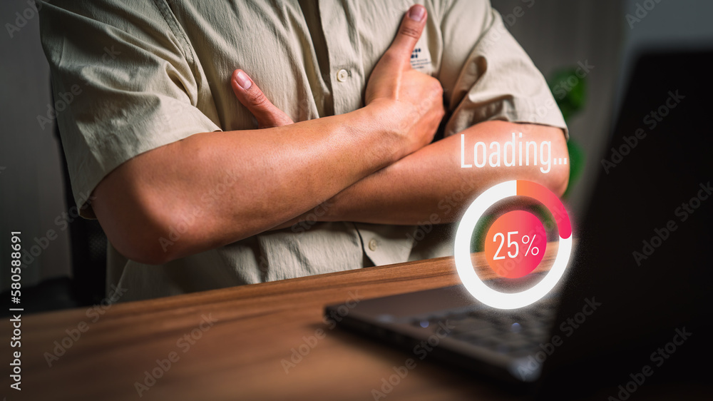 Poster Adult man using a laptop computer for download software and waiting to loading digital business data form website, very slow internet form wifi. Concept of waiting for load of loading symbol.