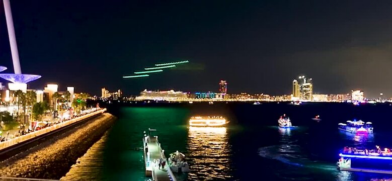 Dubai, UAE - 01.21.2023 - Drone show above the Blue waters island. City