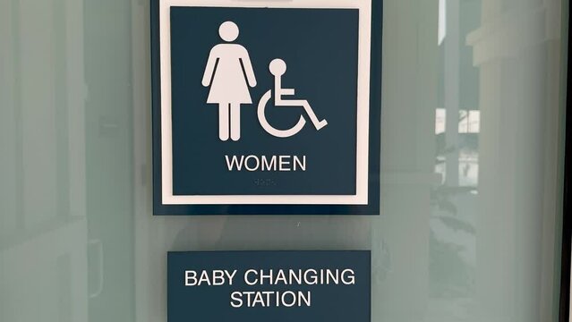 Changing room and toilet sign for women