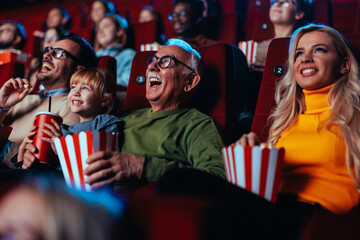 Happy spectators in movie theater.