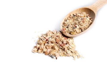 Raw oatmeal with dry fruits in a wooden spoon on a white background, the concept of healthy eating, weight loss, vegan