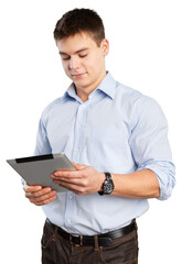Happy young male student using a digital tablet