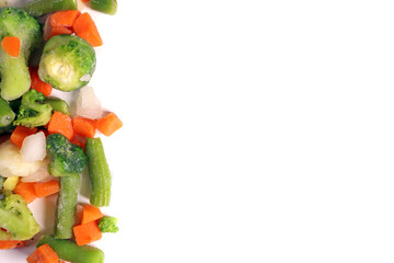 fresh frozen vegetables including broccoli, celera, onion, broccoli on white background
