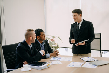 Creative managers crew working with new startup project in modern office. Team brainstorming.