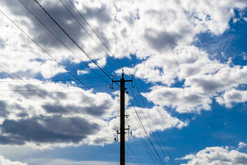 Power electric pole with line wire on colored background close up