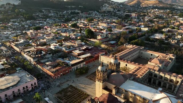 Aerial View of Downtown Oaxaca, Mexico. Buildings, Streets and Santo Domingo de Guzman Church on Golden Hour