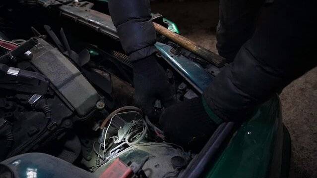 a mechanic disassembles a car to install a turbo engine tuning drift auto
