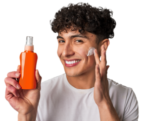 A young man protects his skin from harmful UV rays, applying non-greasy, broad-spectrum sunscreen for a healthy and youthful look.