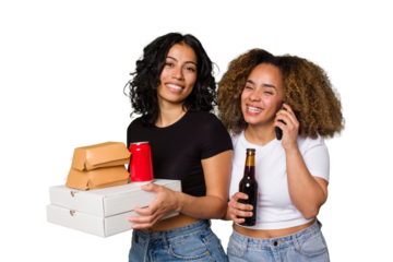Two young women, one Latina and one with Afro hair, laugh as they hold pizzas and burgers from a recent delivery. 