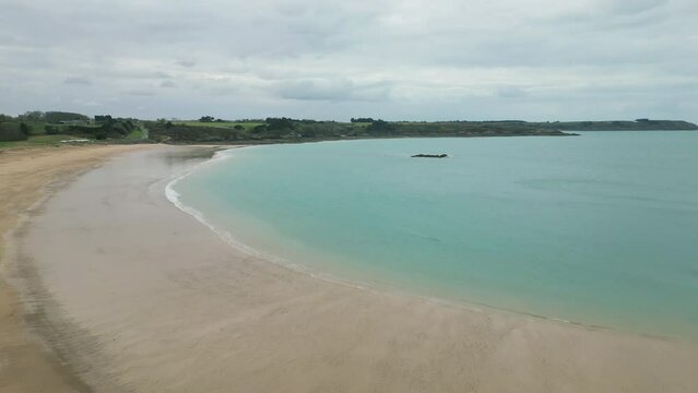 Plage du Guesclin, Brittany in France. Aerial forward 