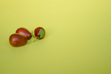 Chinese date fruits - Ziziphus jujuba on yellow background with copy space. Concept of proper nutrition, diet.