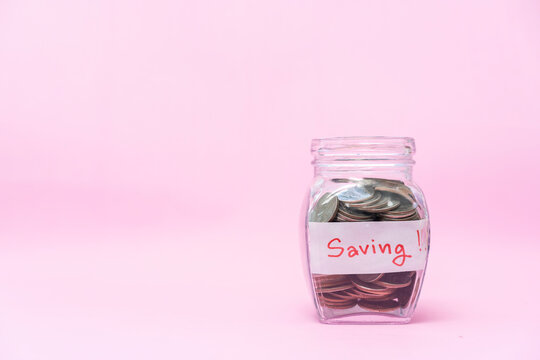 Saving money coin in jar glass, Save money for investment concept.
