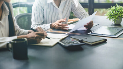 Confident business working woman  working together. Creative female executives meeting in startup office.