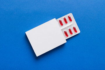 Blank White Product Package Box Mock-up. Open blank medicine drug box with Vatamin a blister top view