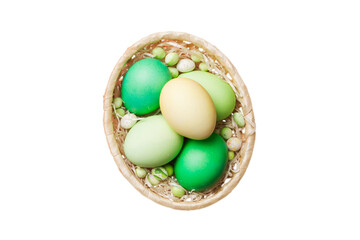 Basket of colorful Easter eggs isolated on white background. Easter basket filled with colored eggs top view holiday concept