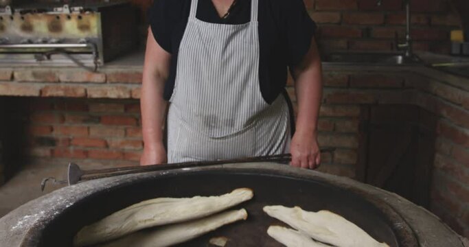 Traditional Delicious Georgian Bread Called Shoti Cooked In Bakery Torne (Turne). Tilt-up