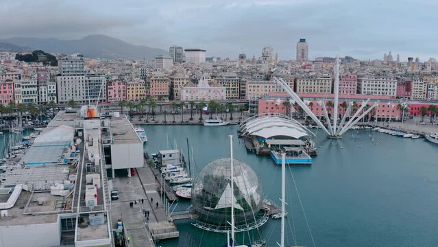 Scenic aerial over Genoa Old Port (Porto Antico), view of Biosfera and Bigo