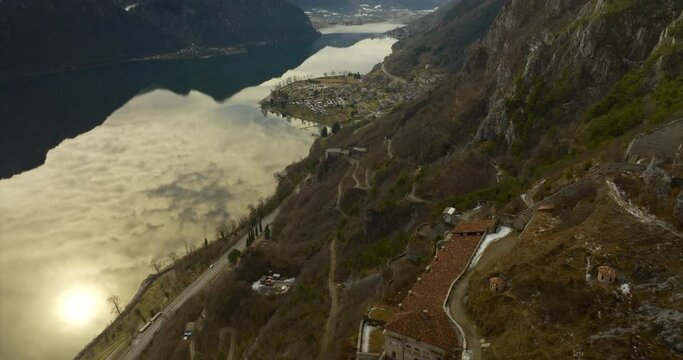 Aerial Drone View Of The Historic Fortification Of Rocca d'Anfo With Lake Idro In The Province of Brescia, Lombardy Italy.