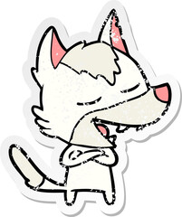 distressed sticker of a cartoon wolf laughing