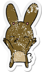 distressed sticker of a curious bunny cartoon