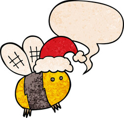 cute cartoon bee wearing christmas hat and speech bubble in retro texture style