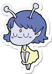 sticker of a cartoon alien girl