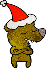 textured cartoon of a bear wearing santa hat