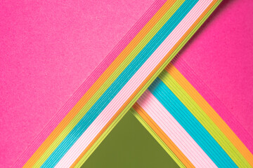 A stack of colorful cardstock overlapping on the diagonal. - Powered by Adobe