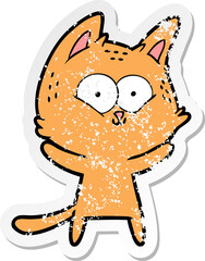distressed sticker of a cartoon cat