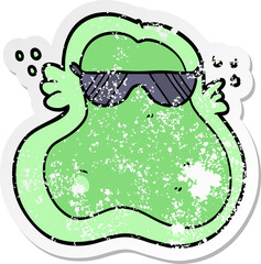 distressed sticker of a cool cartoon amoeba