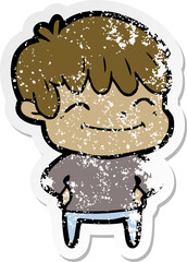 distressed sticker of a happy cartoon boy