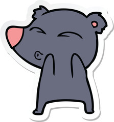 sticker of a cartoon whistling bear