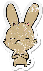 distressed sticker of a curious bunny cartoon