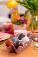 easter eggs in a carton basket