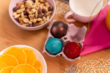 Fototapeta na wymiar chocolate easter eggs with orange and nuts