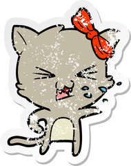 distressed sticker of a cartoon cat