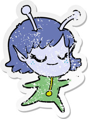 distressed sticker of a smiling alien girl cartoon