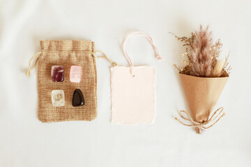 Crystals kit for health. Amethyst, roze quartz, citrine and  obsidian gemstones for healing and protection gift idea. Flat lay, top view with tag mockup © netrun78