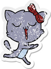 distressed sticker of a cartoon cat