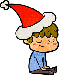 textured cartoon of a happy boy wearing santa hat