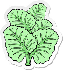 sticker of a cartoon cabbage leaves